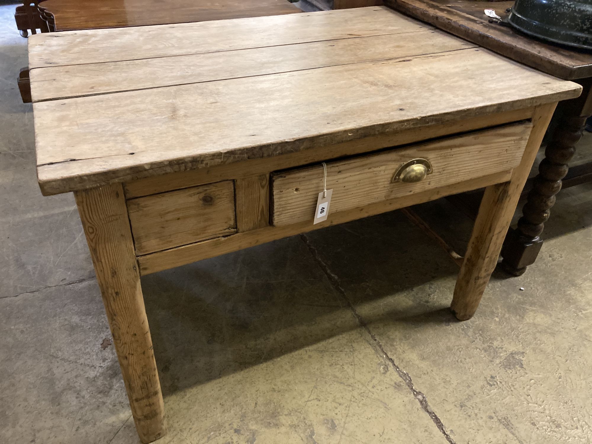 A 19th century pine and fruitwood kitchen table, width 105cm, depth 77cm, height 72cm
